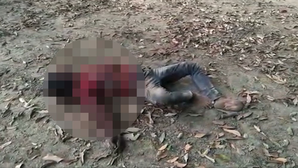 খুন হওয়া যুবকের দেহ।