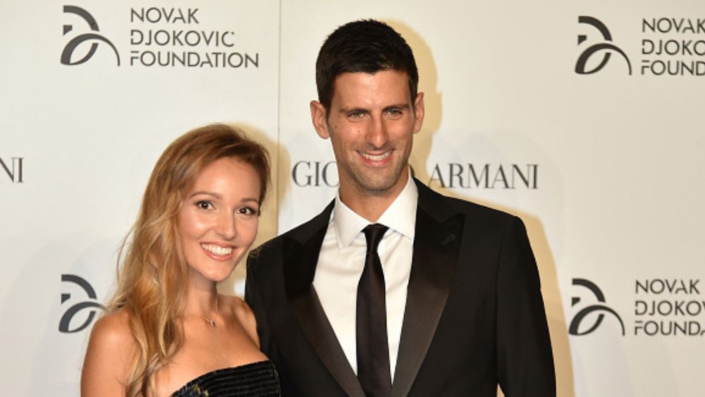 স্ত্রী জেলিনার সঙ্গে নিজের সংগঠনের অনুষ্ঠানে জোকোভিচ। 