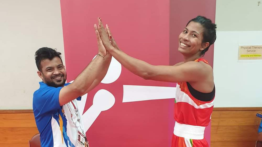 উল্লাসের সেই মুহূর্ত। জয়ের পর আলি কামারের সঙ্গে লভলিনা। ছবি - ফেসবুক