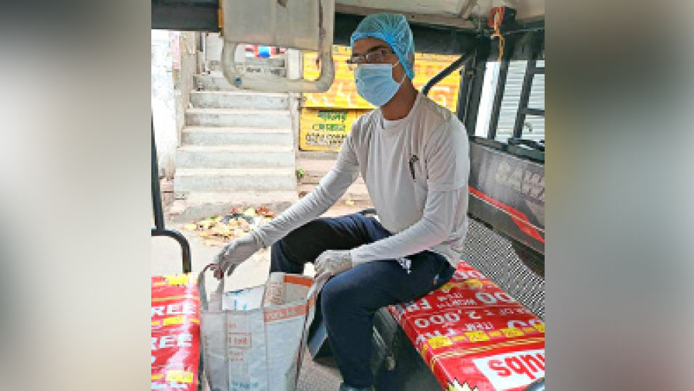 Amid of exam young man is helping covid patients 