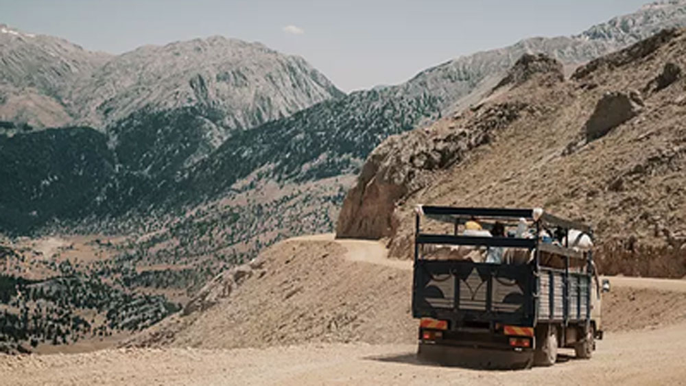 তাঁর সংস্থায় কাজ করেন অন্তত ৫০০ জন। দেশের বাইরেও যাতায়াত করে তাঁর ট্রাক।