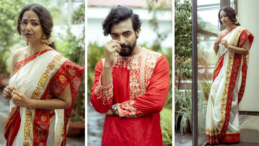 তিন ধরনের পোশাকে সেজেছেন সোহিনী-রণজয়। লাল পেড়ে সাদা শাড়িতে সোহিনী যখন নিজেকে সাজিয়েছেন, রণজয় তখন পরেছেন লাল রঙা পাঞ্জাবি।
