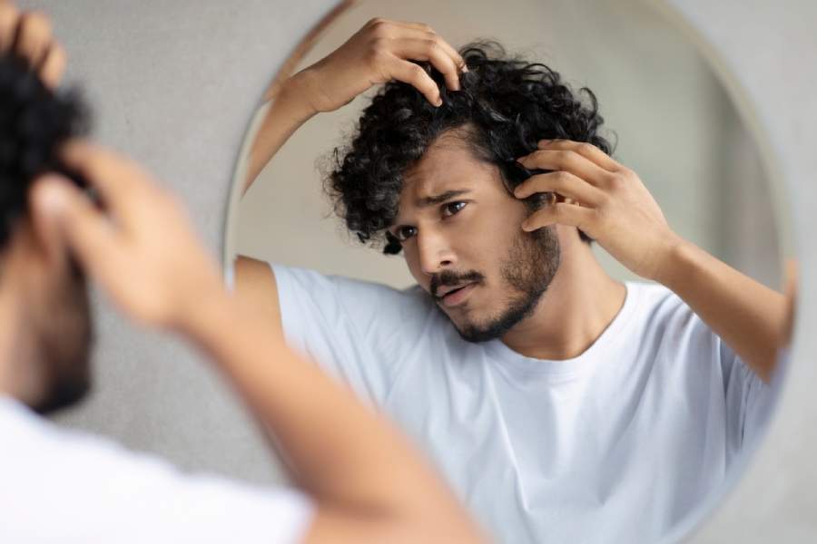 খুসকির ভাল দাওয়াই হল পাতিলেবু।