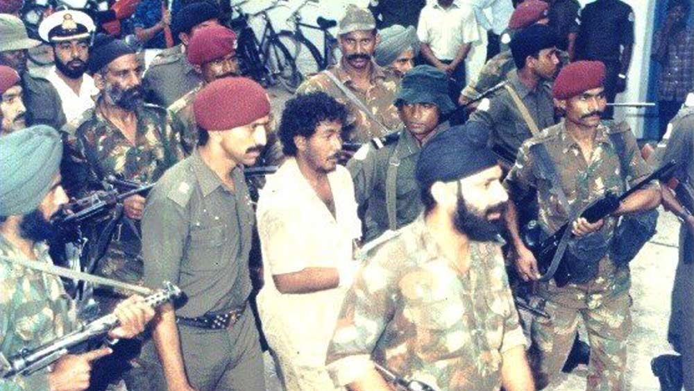 উত্তর এবং উত্তর-পূর্ব শ্রীলঙ্কায় এলটিটিইর প্রভাব বৃদ্ধির ফলে কোণঠাসা হয়ে পড়া প্লট ভারত মহাসাগরে নতুন একটি নিরাপদ ঘাঁটির সন্ধান করছিল। তাই তারা হাত মেলায় লুতিফির সঙ্গে। অন্য দিকে লুতিফি চেয়েছিলেন প্রেসিডেন্ট হতে।