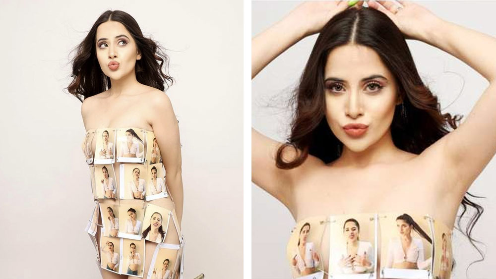 নিজেরই প্রিন্ট করা ছবি সেফটি পিন দিয়ে আটকে পরতে দেখা গিয়েছে তাঁকে। ‘পরার মতো কোনও জামা নেই’ বলে মন্তব্য করেন অনেকে। কেউ কেউ বলেন, ‘সেফটি পিনই ভরসা’।