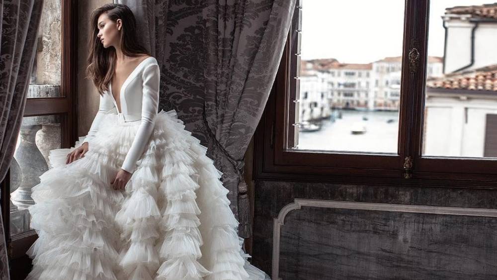 Russia Ukraine War  Russia Ukraine war: A Ukrainian bridal brand is making  wedding gowns and army assault vests dgtl - Anandabazar