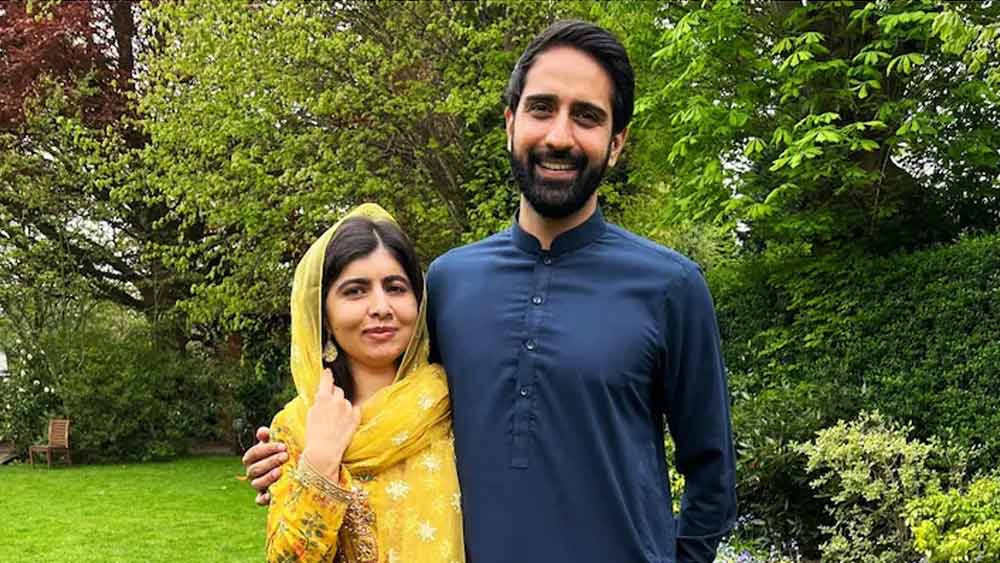 স্বামী আসের মালিকের সঙ্গে ইদের সাজে মালালা। 