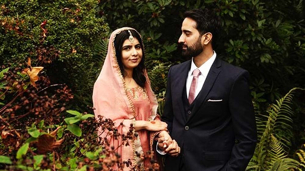 বিয়ের সাজে দম্পতি। 