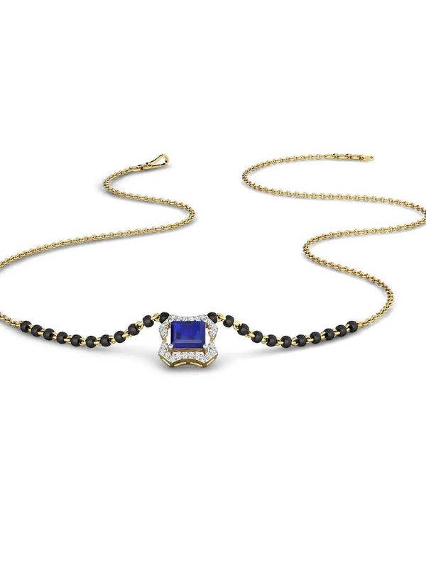 জেমস্টোন ড্রপ মঙ্গলসূত্র: জমকালো নয়, বরং হাল্কা গয়নাতেই স্বচ্ছন্দ? তা হলে জেমস্টোন ড্রপ মঙ্গলসূত্র হয়ে উঠতে পারে একেবারে আদর্শ। প্রতিদিন পরারও উপযুক্ত এই ডিজাইনের মঙ্গলসূত্র।