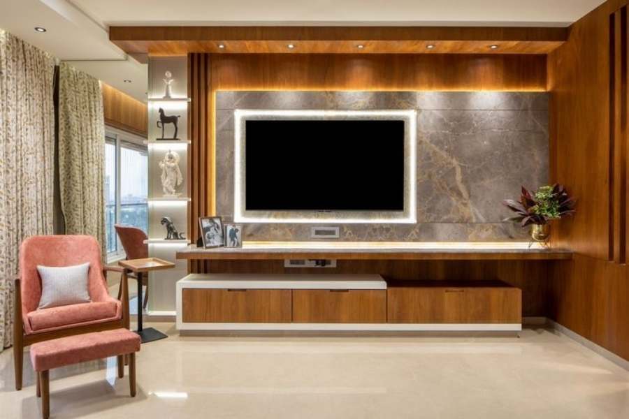  কালী পুজোর আগে ঘর সাজাচ্ছেন। নতুন ভাবে সাজিয়ে তুলতে পারেন আপনার টিভি রাখার জায়গাটিও। এই প্রতিবেদনে রইল আপনার জন্য কিছু ট্রেন্ডিং টিভি ইউনিট ডিজাইনের হদিস। আলোর চমকে সেজে উঠুক আপনার টিভি রাখার জায়গাটি। 