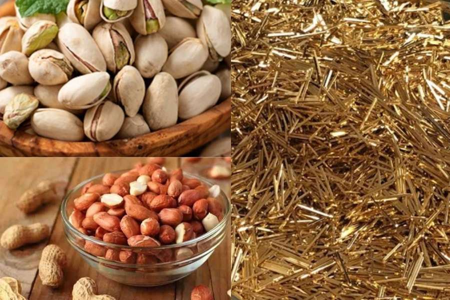 বাদাম, পেস্তা-সহ অন্যান্য ড্রাই ফ্রুটের সঙ্গে সোনার প্রলেপ দিয়ে তৈরি হচ্ছে এই মিষ্টি।  