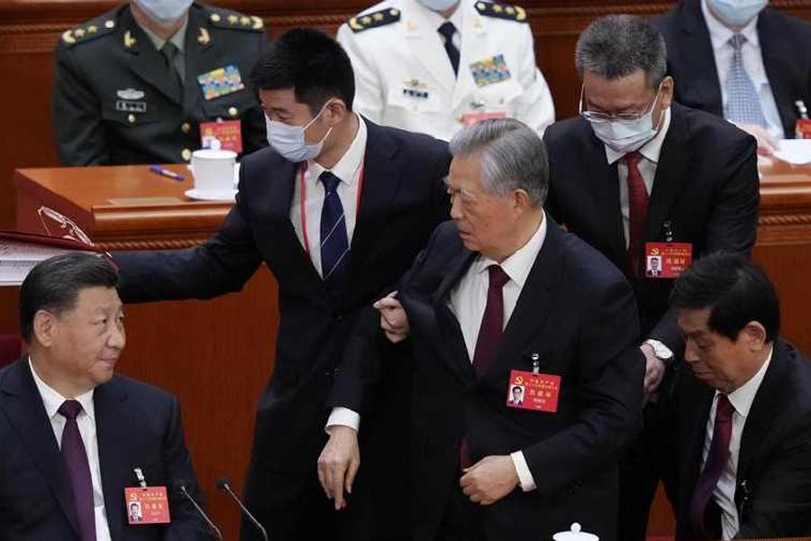 Hu Jintao mysteriously escorted out of party congress