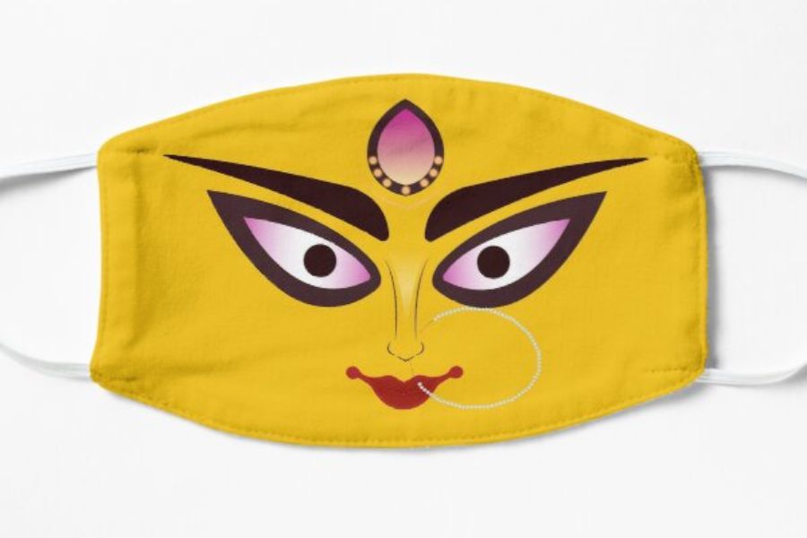 দুর্গার মুখ আঁকা মাস্ক: পুজোতে ফ্যাশনের টপ লিস্টে কিন্তু এই ধাঁচের সাজ। ব্লাউজ থেকে শাড়ি, প্রায় সব কিছুতেই দুর্গার মুখ। বাজারে তাই রমরমিয়ে বিক্রি হচ্ছে এ রকম মাস্কও।  চাইলে আপনিও এই ধরনের মাস্কে হয়ে উঠতে পারেন ট্রেন্ডিং। 