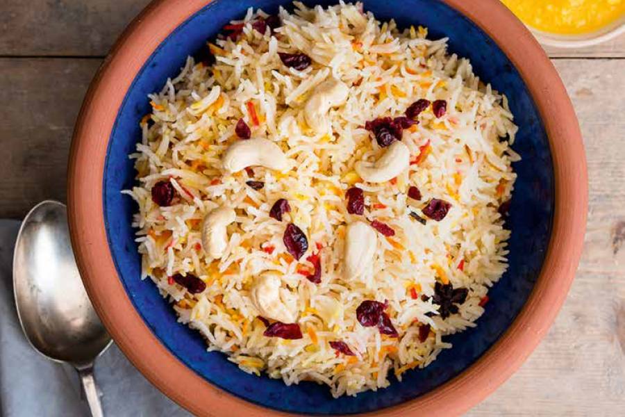 সপ্তমীর দিন নিরামিষ খেতে চাইলে খুব সহজেই বানিয়ে নিতে পারেন ঘি ভাত।