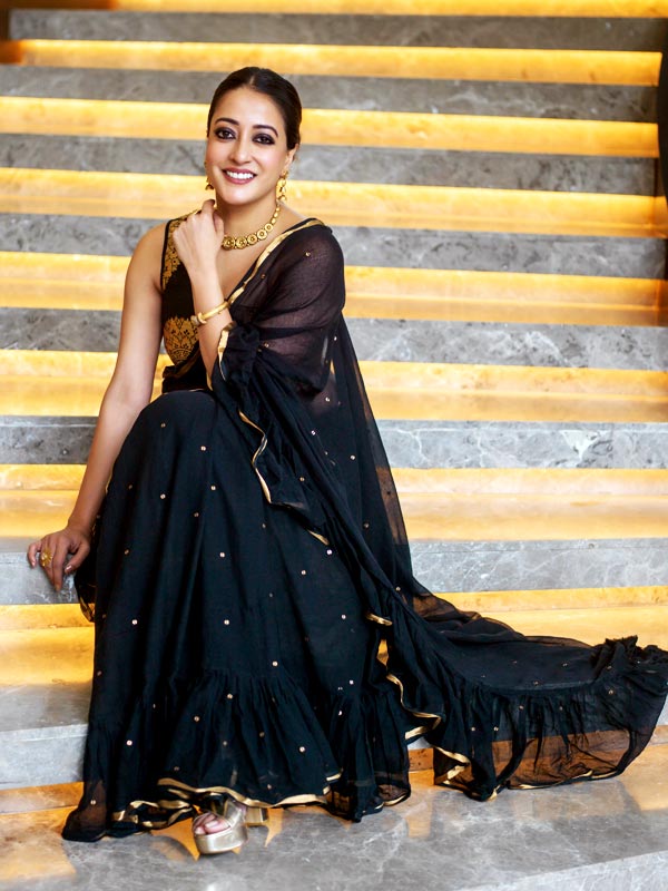 কালোতেই জমেছে রাইমার নবমীর সাজ।