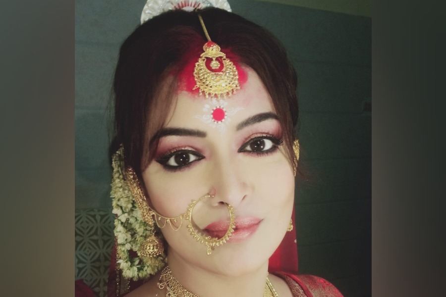 Rimjhim Mitra post a pic in her bridal attire on her facebook page