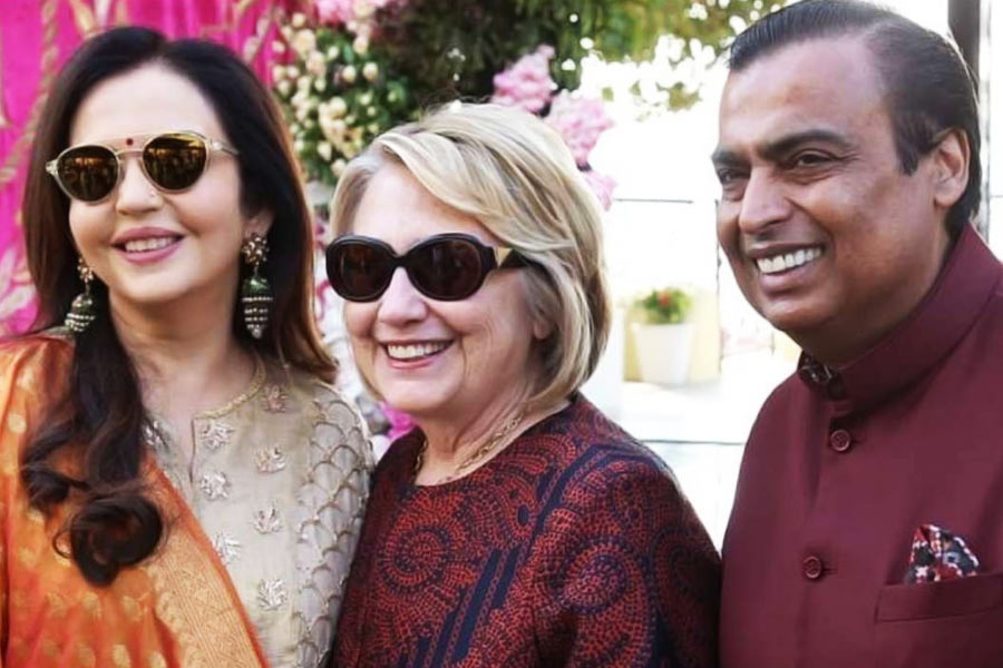 image of hilary clinton with Ambani