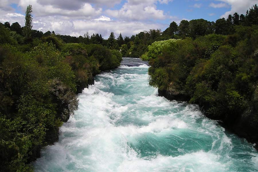 The Rainbow River in Colombia has different colored water flow to attract tourists.