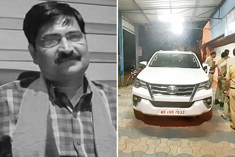 raju jha and White SUV car