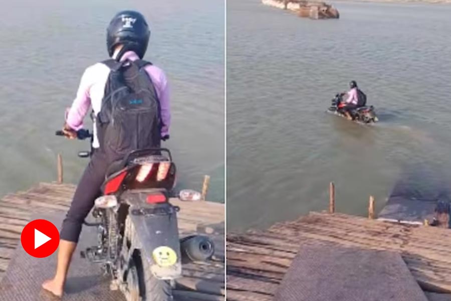man driving bike in the river