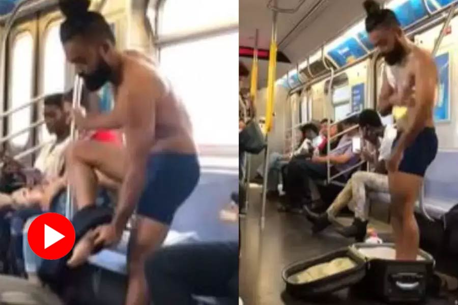 man bathed in metro