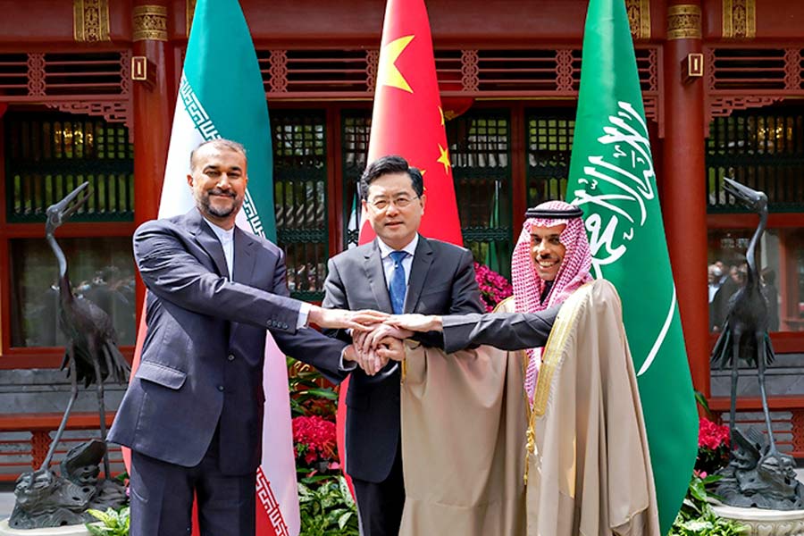 A Photograph of foreign ministers of Iran, China and Saudi Arab