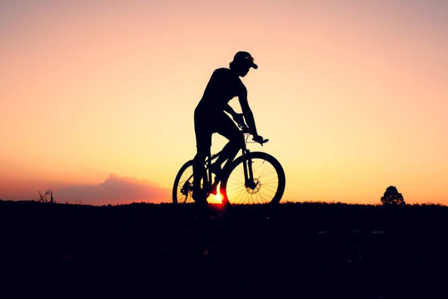 Representative image of a boy riding bicycle