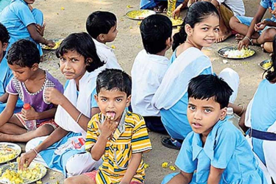 Children enjoying their mid day meal