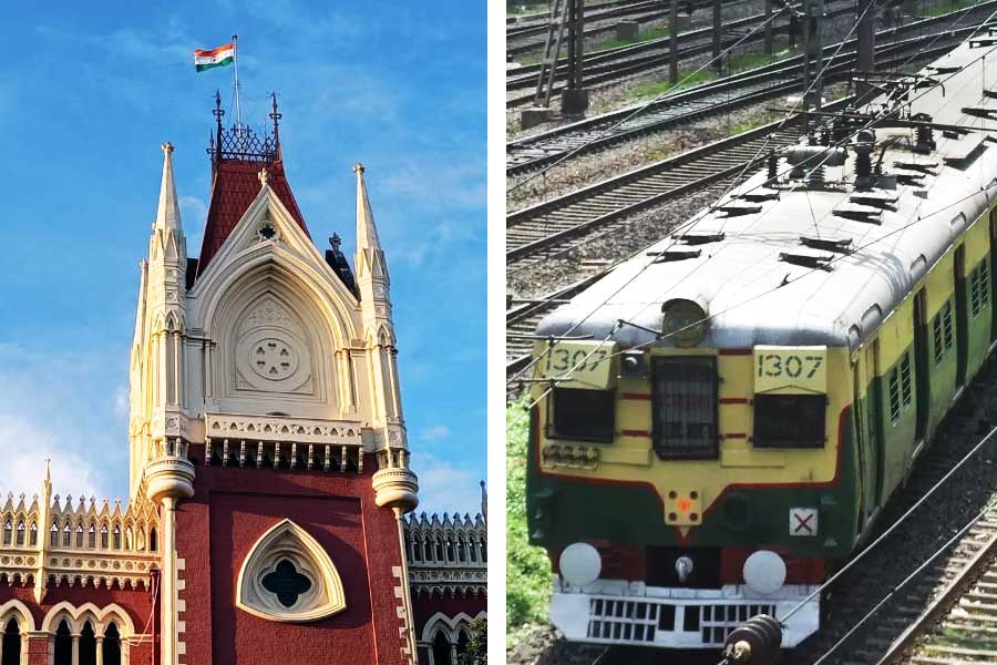 A photograph of Calcutta High court and train. 