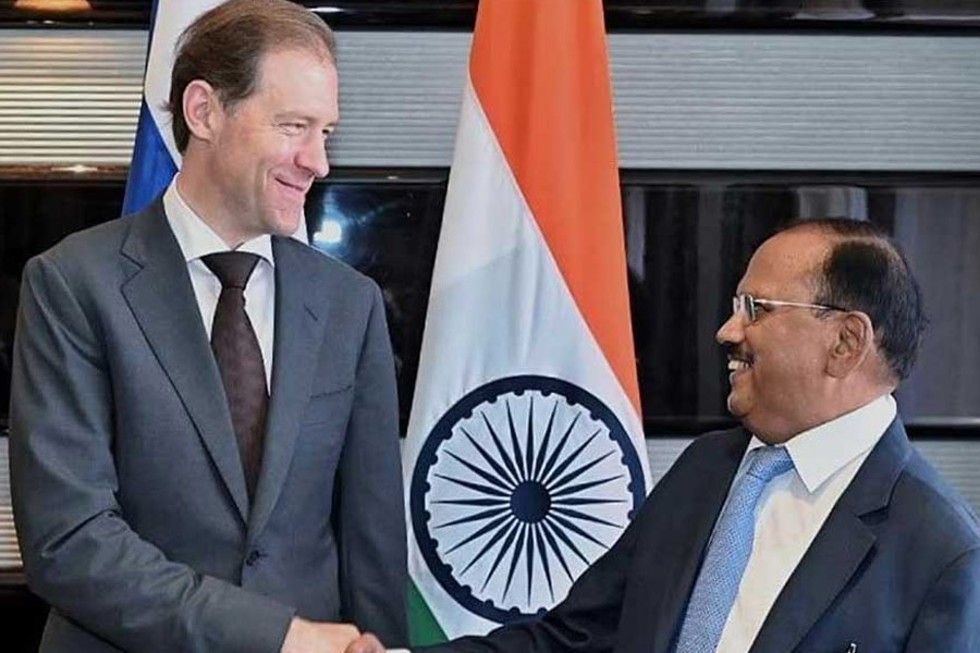 A Photograph of National Security Advisor Ajit Doval and Russian Deputy Prime Minister and Minister of Trade and Industry Denis Manturov