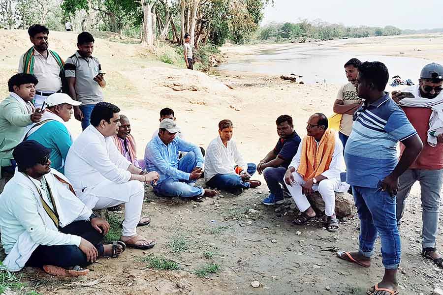 TMC leaders and workers beside subarnarekha river