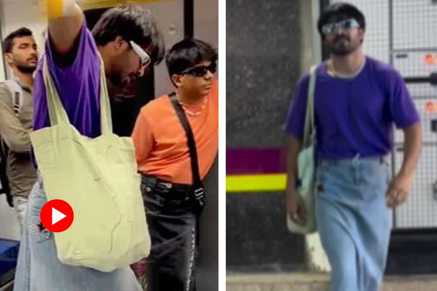 Two guys roaming around in Delhi Metro wearing denim skirt, Video goes viral.