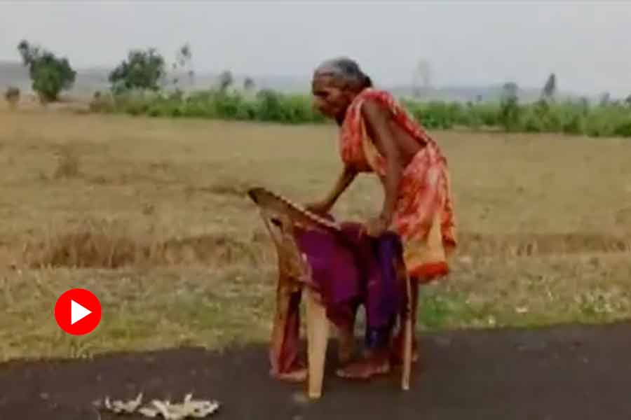 70 year old Odisha woman walks barefoot using a broken chair to collect pension but Fails To Withdraw.