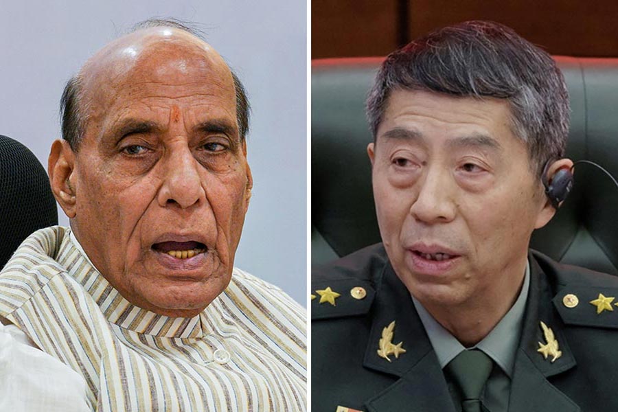 An image of Indian Defense Minister Rajnath Singh and Chinese Defense Minister General Li Shangfu