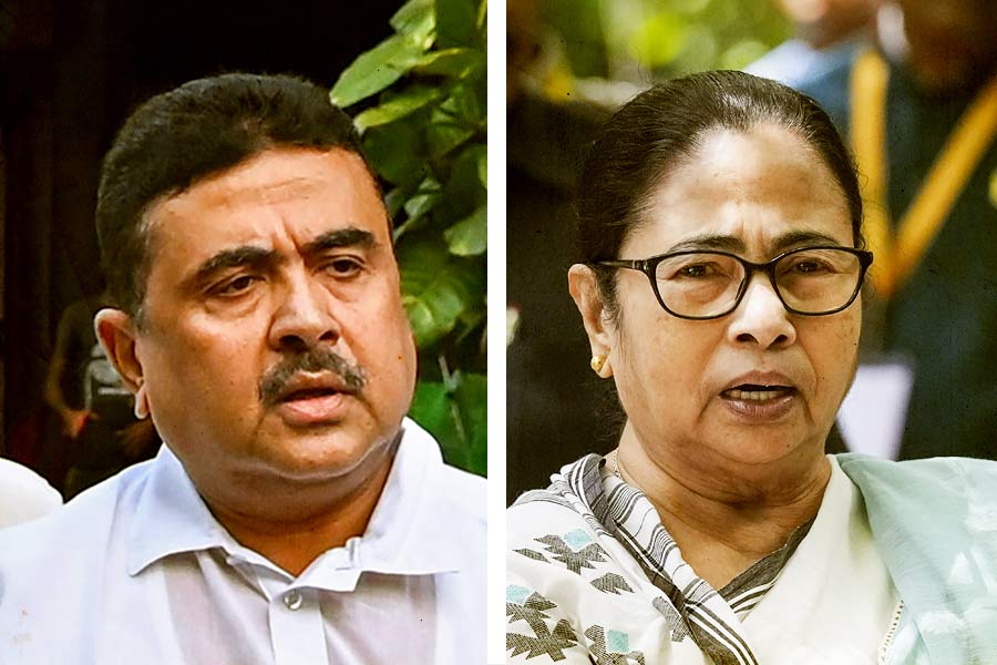 Suvendu Adhikari and Mamata Banerjee,