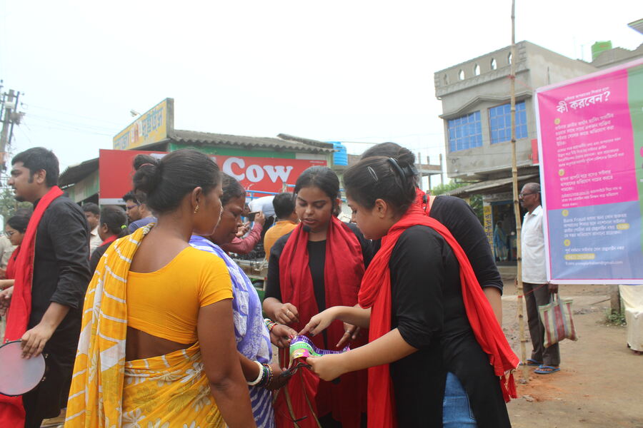 Students from Department of Mass Communication, Burdwan University are distributing leaflets.