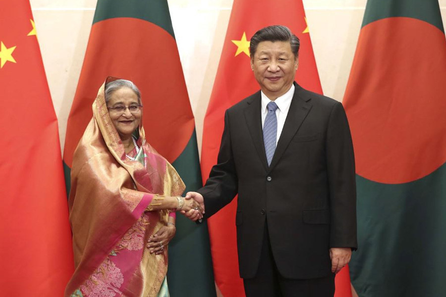 An image of Xi Jinping and Sheikh Hasina