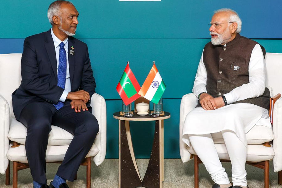 An image of Mohamed Muizzu and Narendra Modi