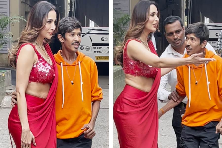 Malaika Arora keeps calm when a physically challenged fan puts his hand on her waist