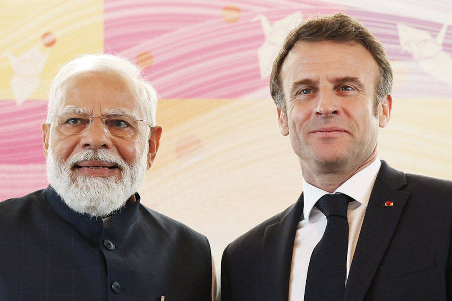 PM Narendra Modi and Emmanuel Macron.