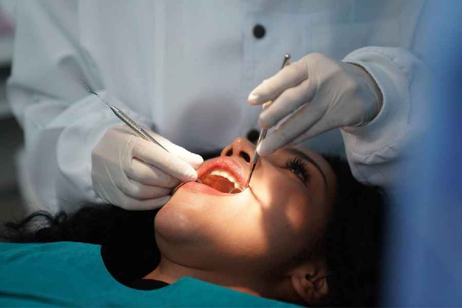 woman filed a case against the dentist for medical negligence.