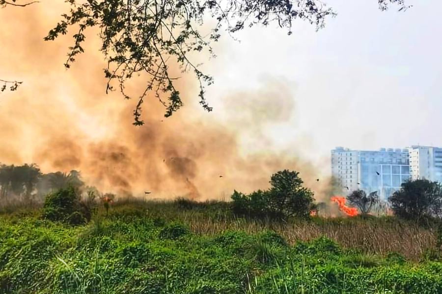 An image shows fire broke out in New Town which is another reason of air pollution 