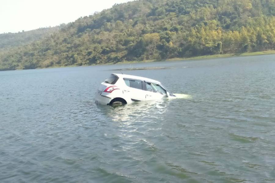 car submerged in a dam