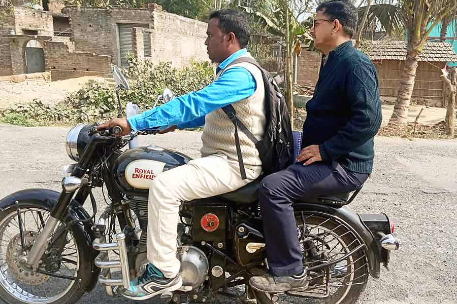 Central Government team travelling by motorbike at Domkal