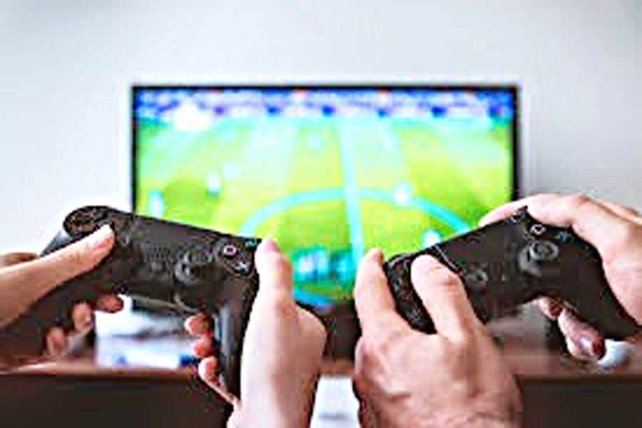 A Photograph representing 2 people playing video games