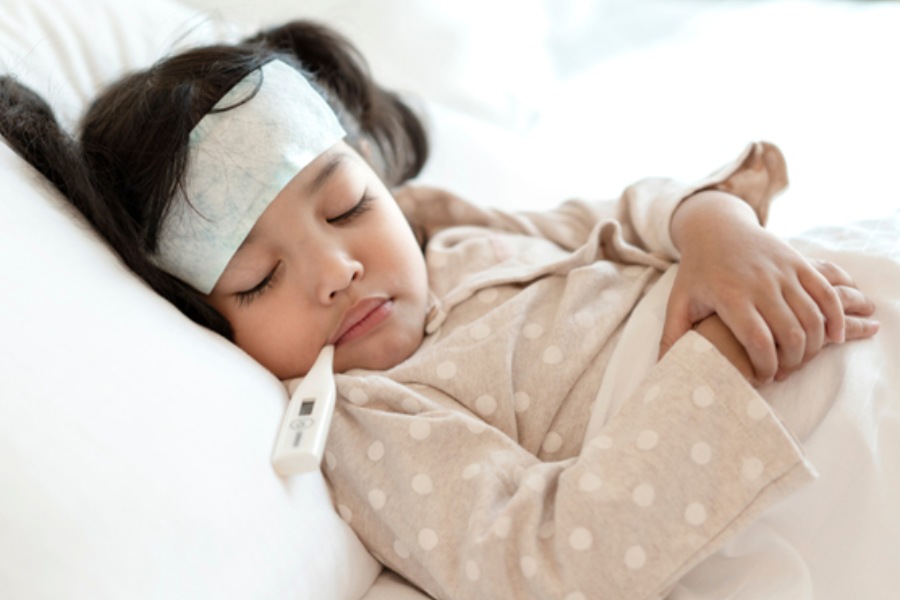 A Photograph representing a child suffering from fever 