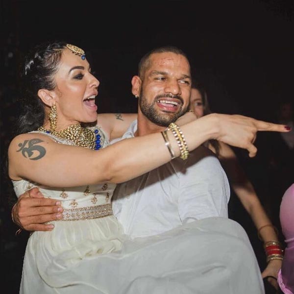 Picture of Aesha Mukerji and Shikhar Dhawan