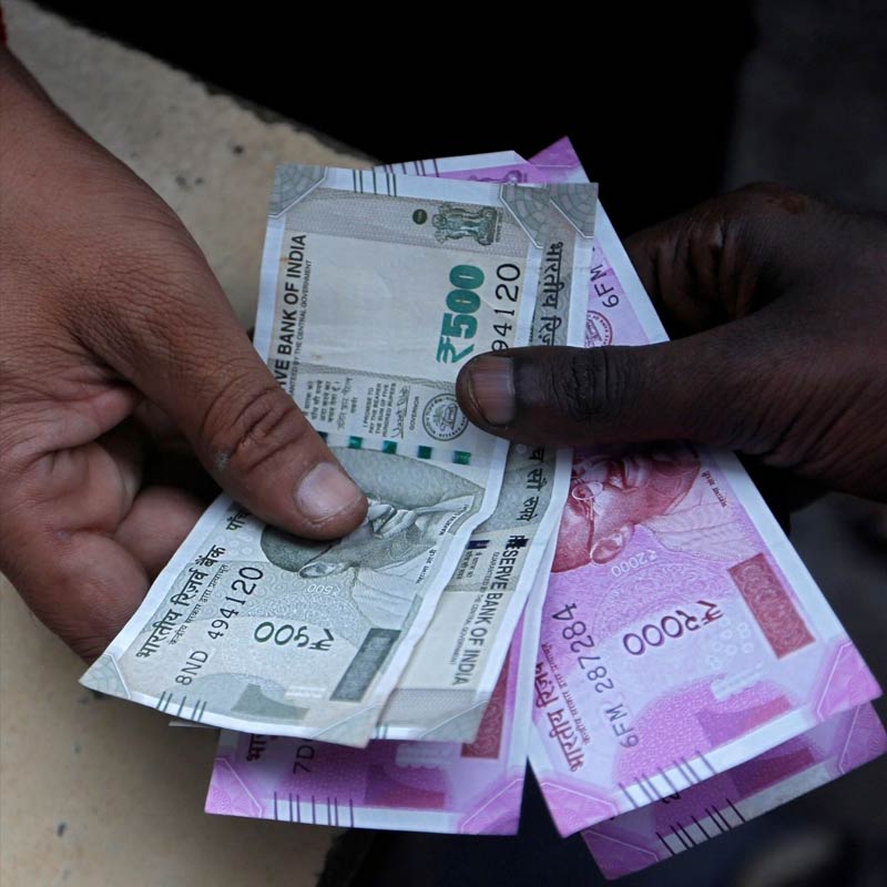 A photograph of Indian currency notes.