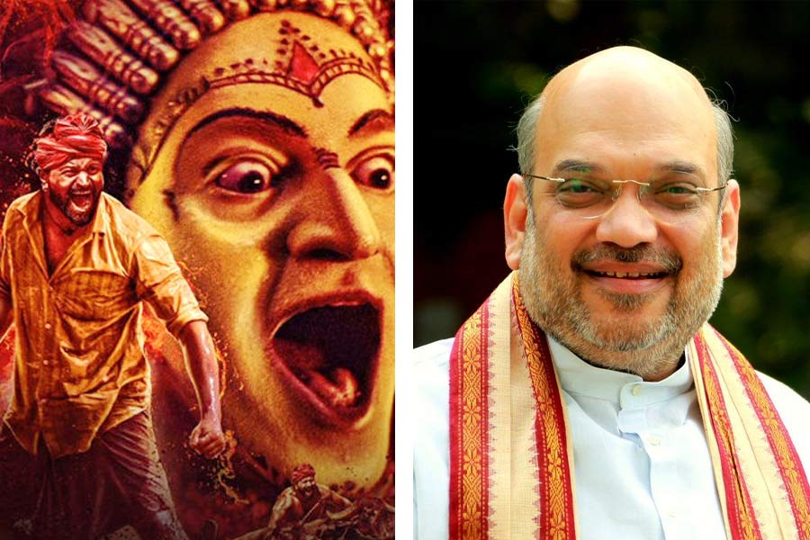 Still Picture From Kantara movie on left side amit shah picture