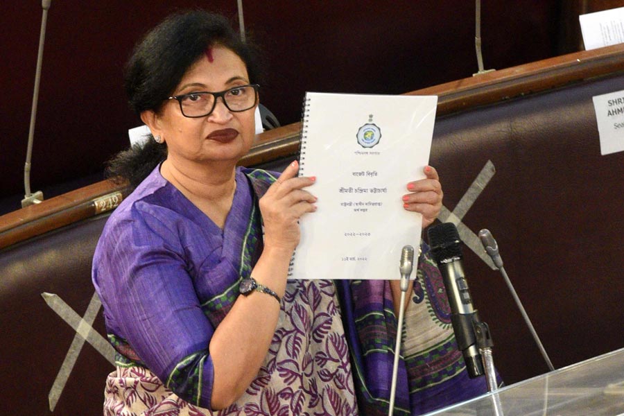Chandrima Bhattacharya tabling the budget.